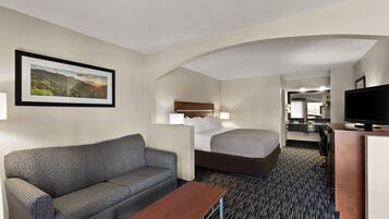 Desk, laptop workspace, blackout drapes, iron/ironing board