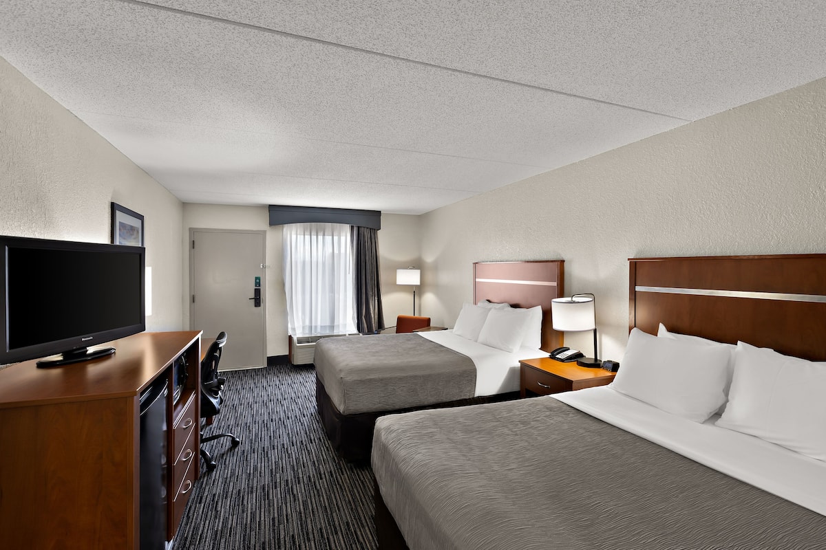 desk, laptop workspace, blackout curtains, iron/ironing board