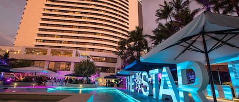 Outdoor pool, open 6 AM to 9 PM, pool umbrellas, pool loungers