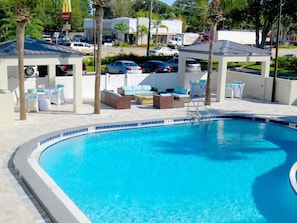 Outdoor pool, open 9:00 AM to 10:00 PM, sun loungers