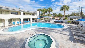 Outdoor pool, open 9:00 AM to 10:00 PM, sun loungers