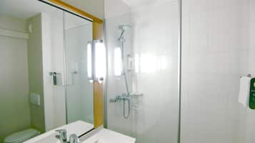 Shower, eco-friendly toiletries, hair dryer, towels