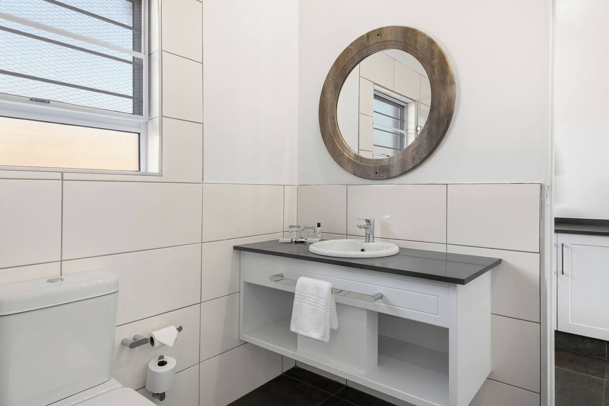 shower, eco-friendly toiletries, hair dryer, towels