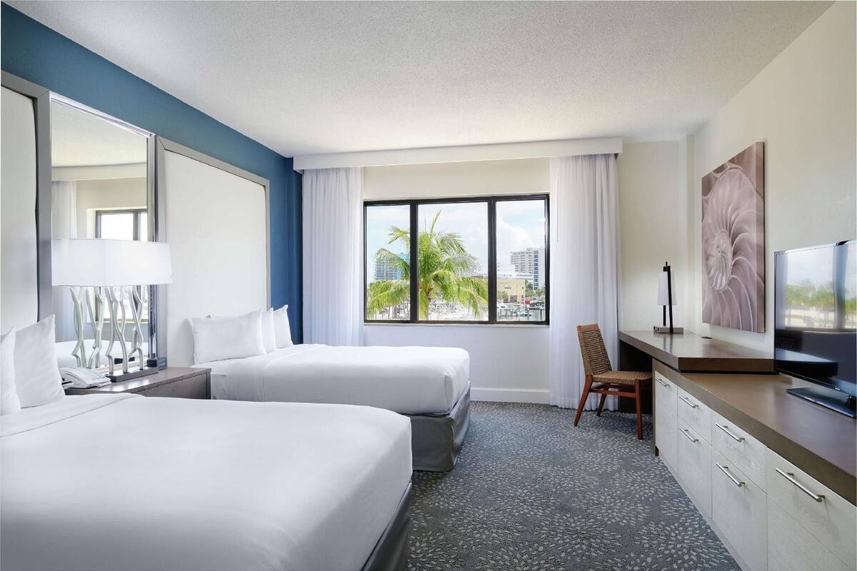 Down comforters, pillowtop beds, in-room safe, desk