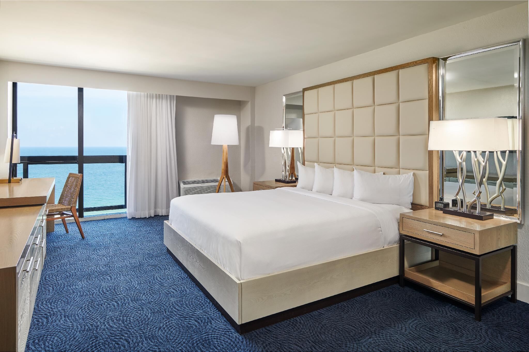 Down comforters, pillowtop beds, in-room safe, desk