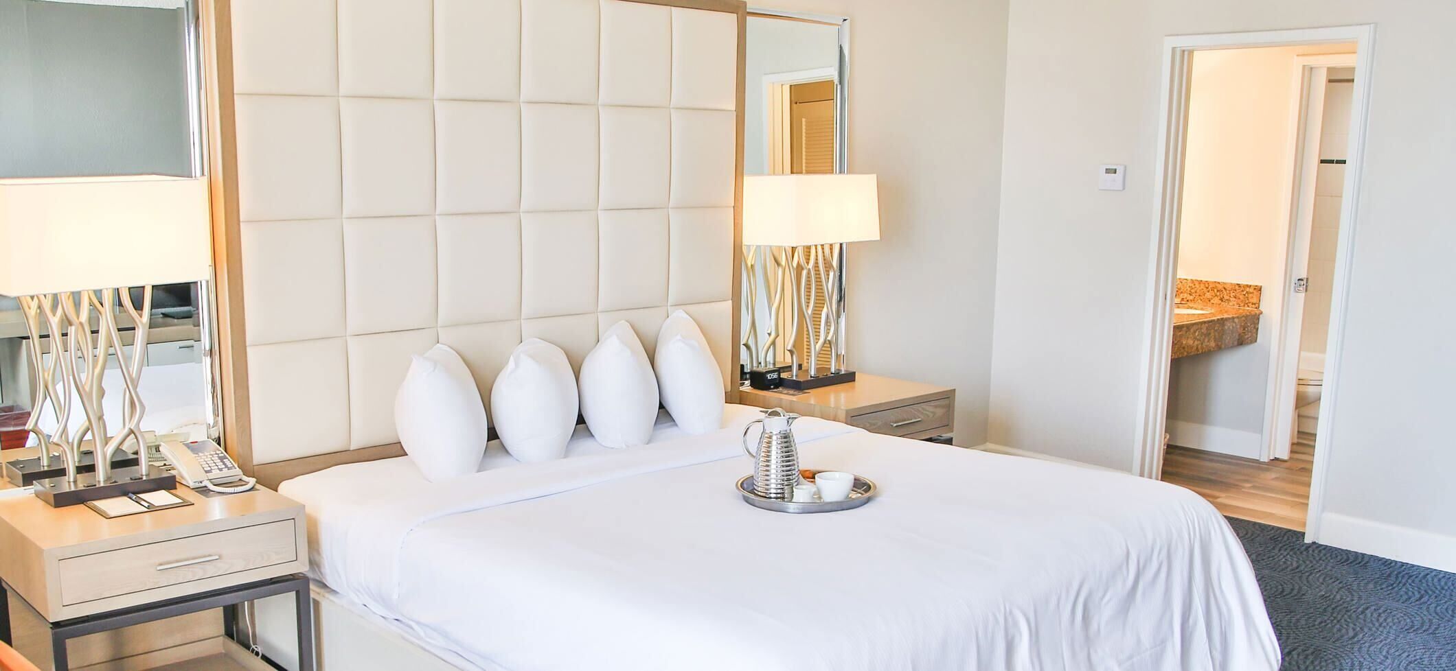 Down comforters, pillowtop beds, in-room safe, desk