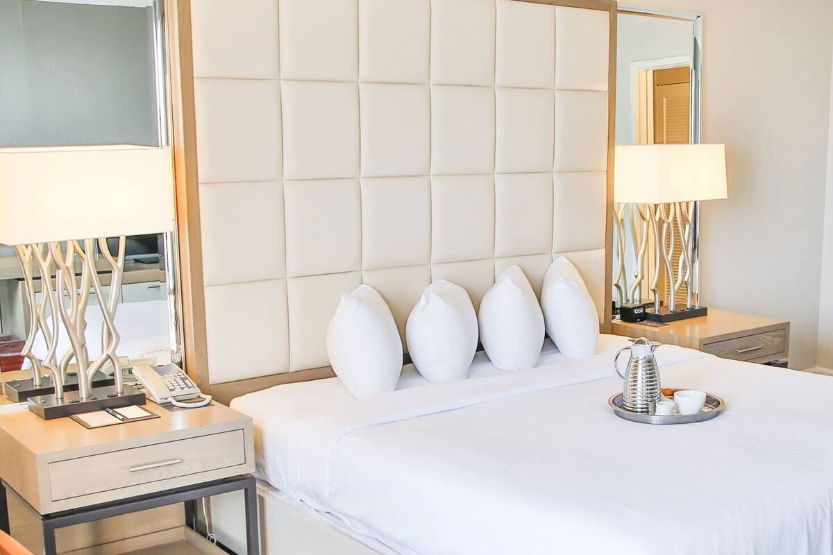 Down comforters, pillowtop beds, in-room safe, desk