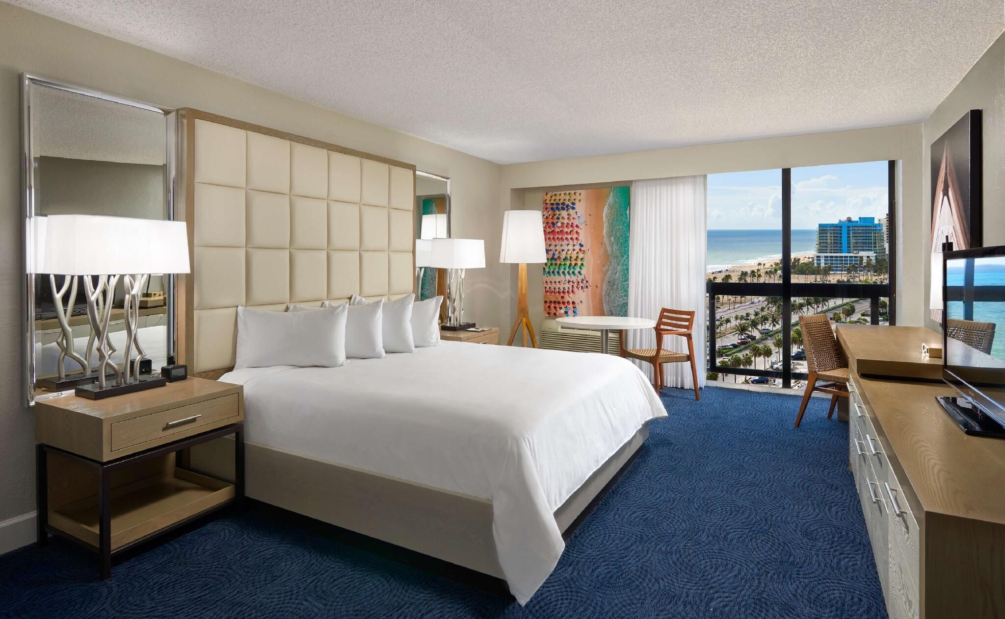Down comforters, pillowtop beds, in-room safe, desk