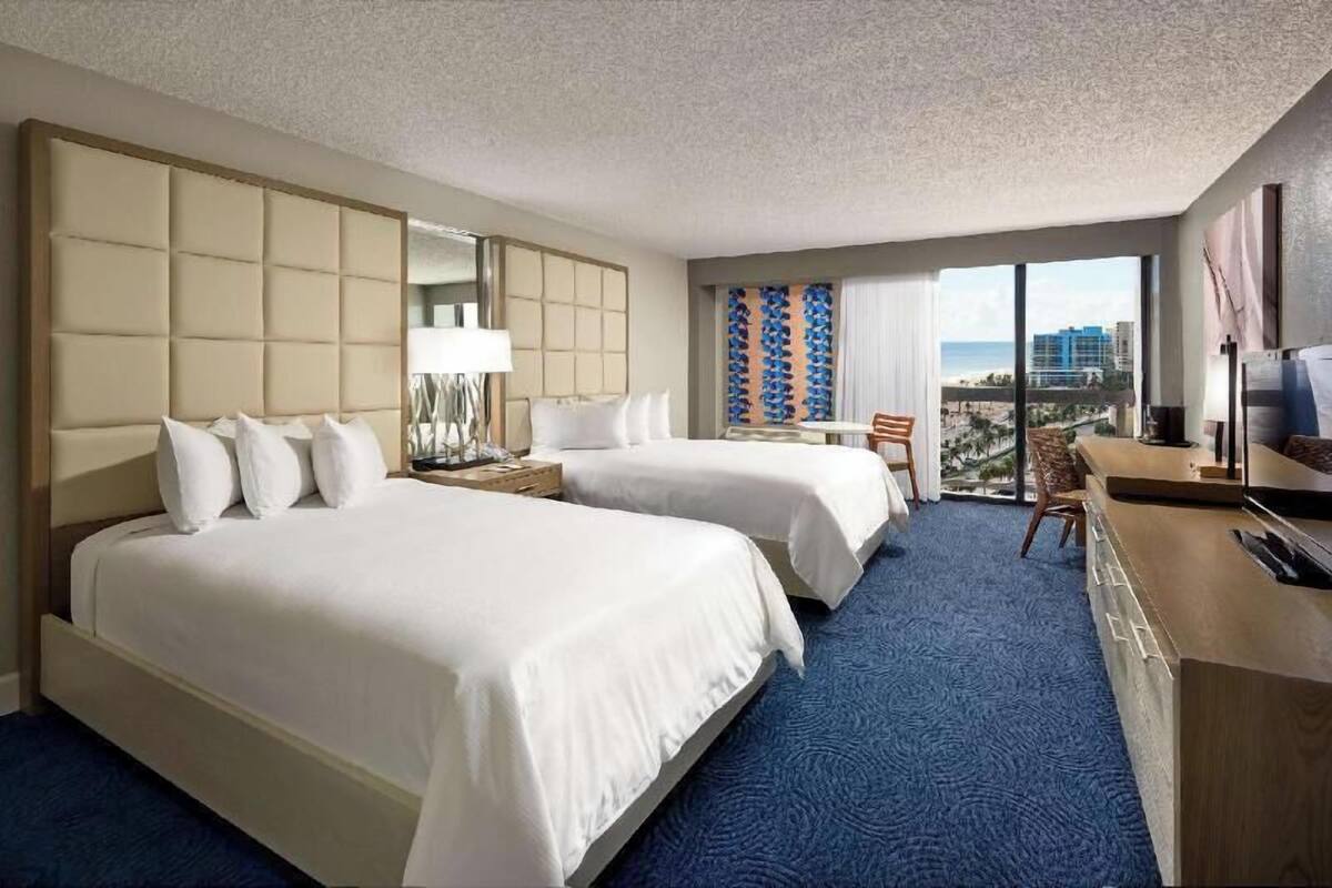 Down comforters, pillowtop beds, in-room safe, desk