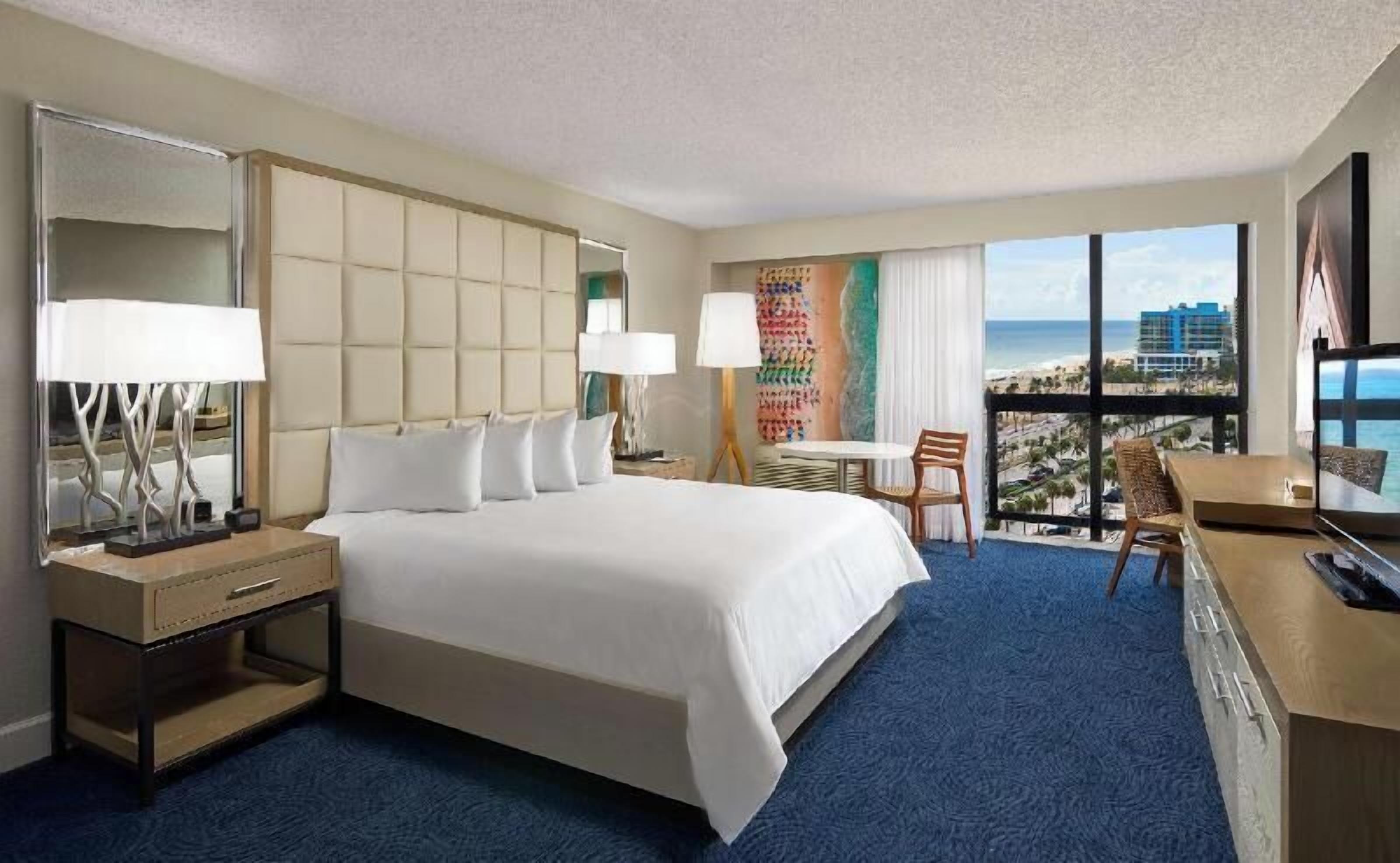 Down comforters, pillowtop beds, in-room safe, desk