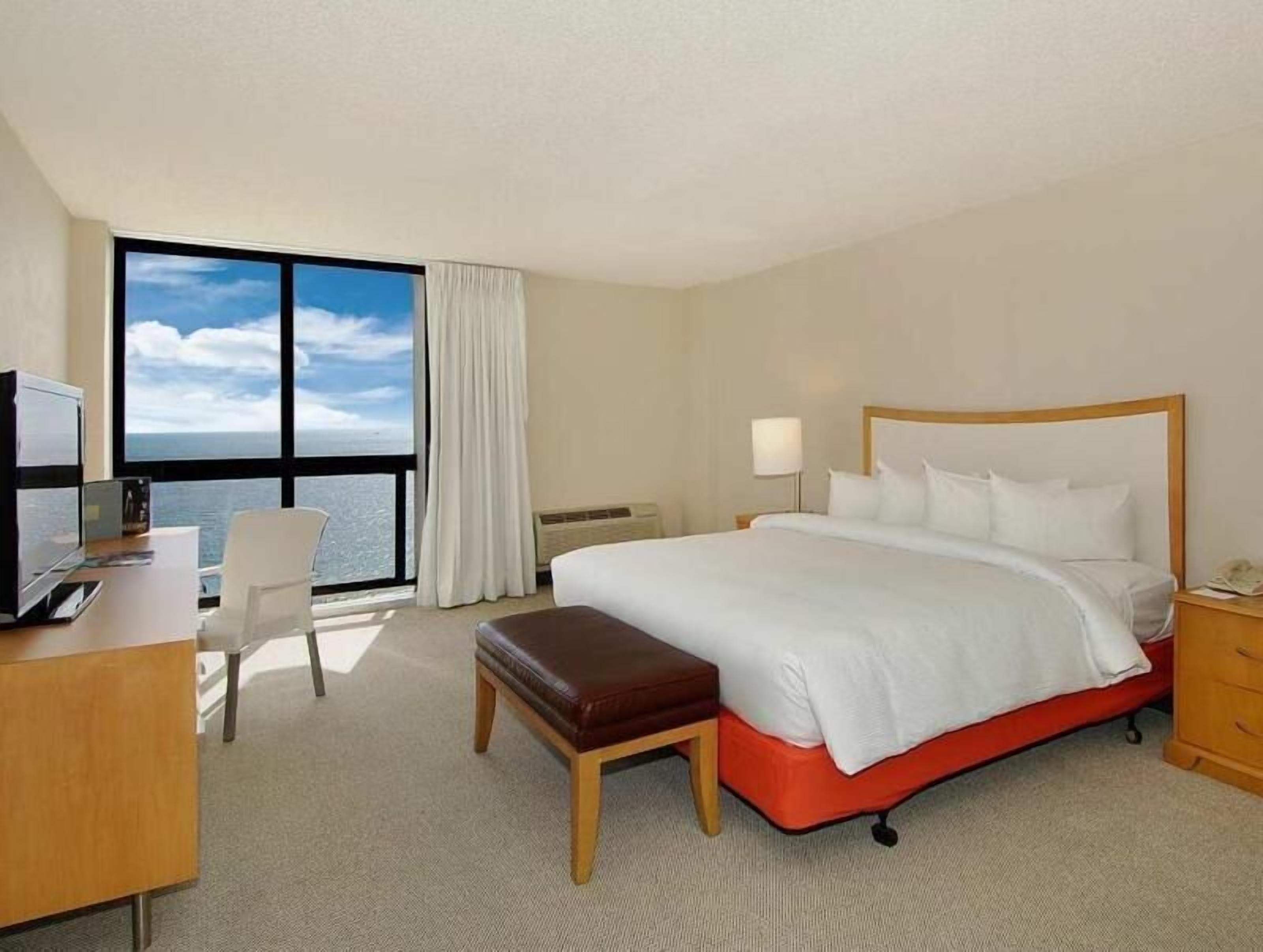 Down comforters, pillowtop beds, in-room safe, desk