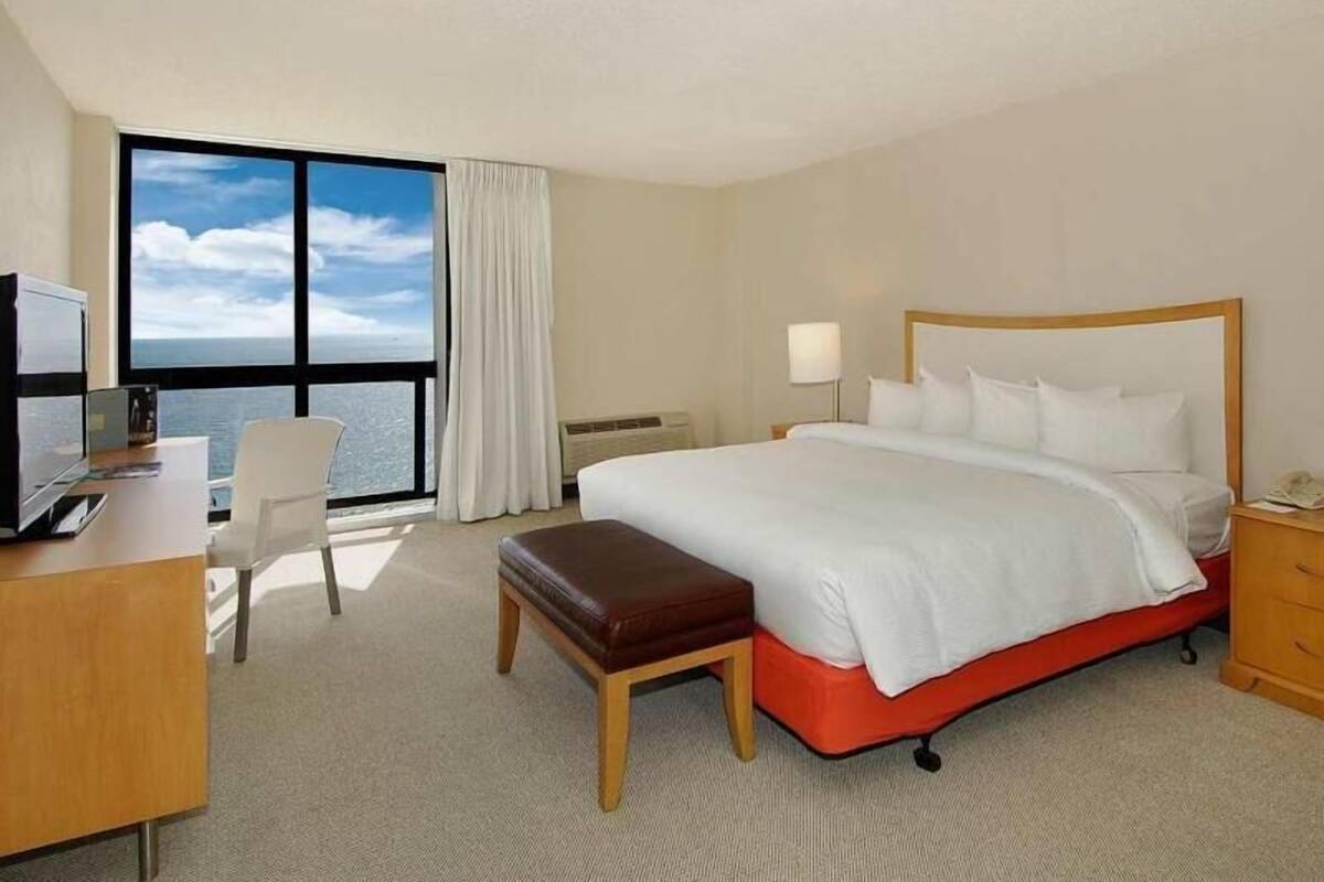 Down comforters, pillowtop beds, in-room safe, desk