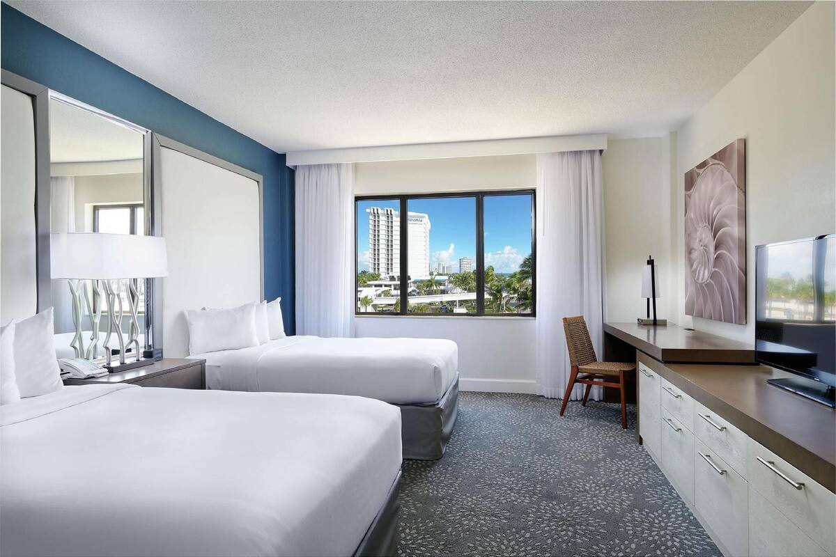 Down comforters, pillowtop beds, in-room safe, desk
