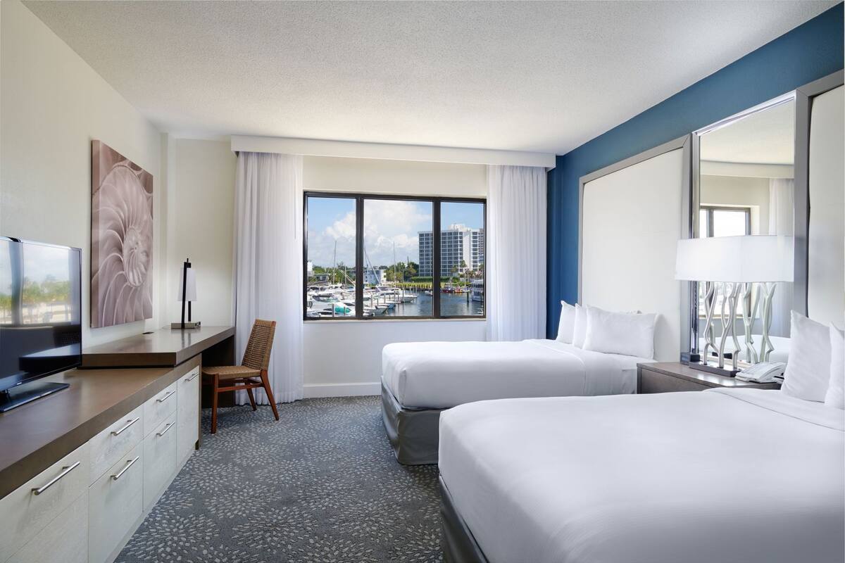 Down comforters, pillowtop beds, in-room safe, desk