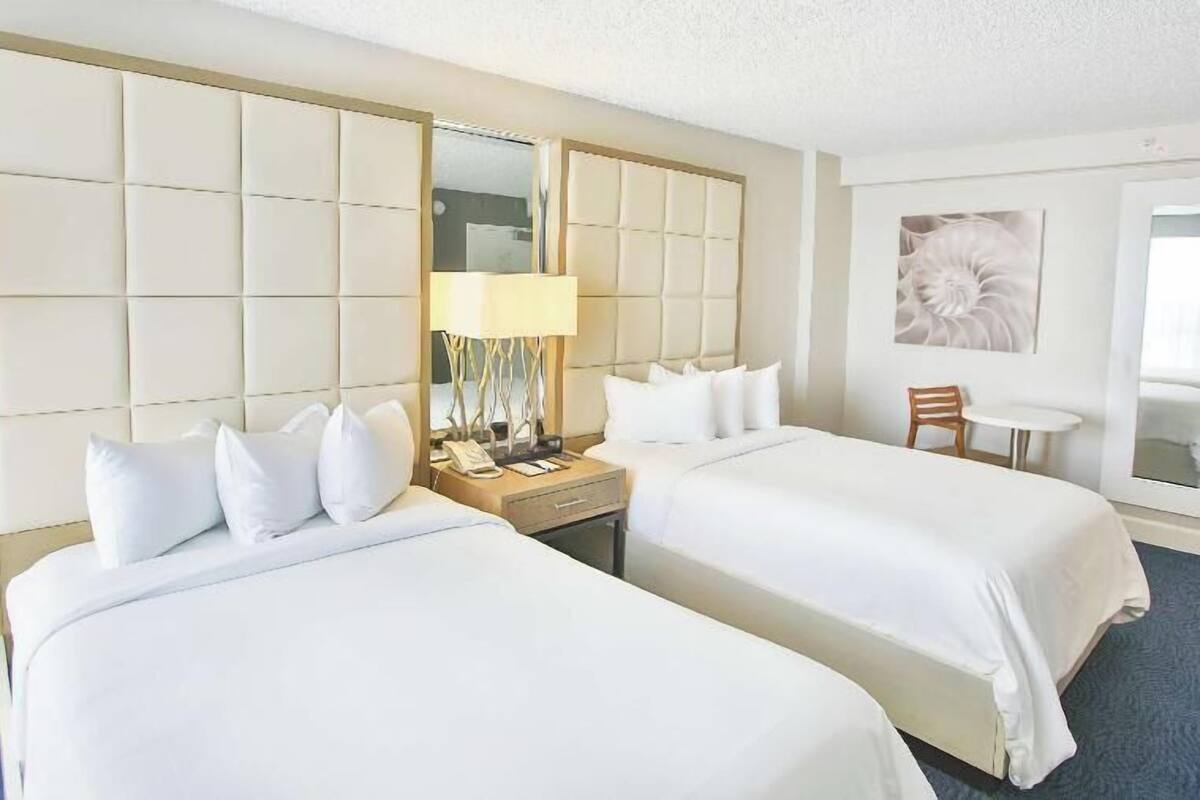 Down comforters, pillowtop beds, in-room safe, desk