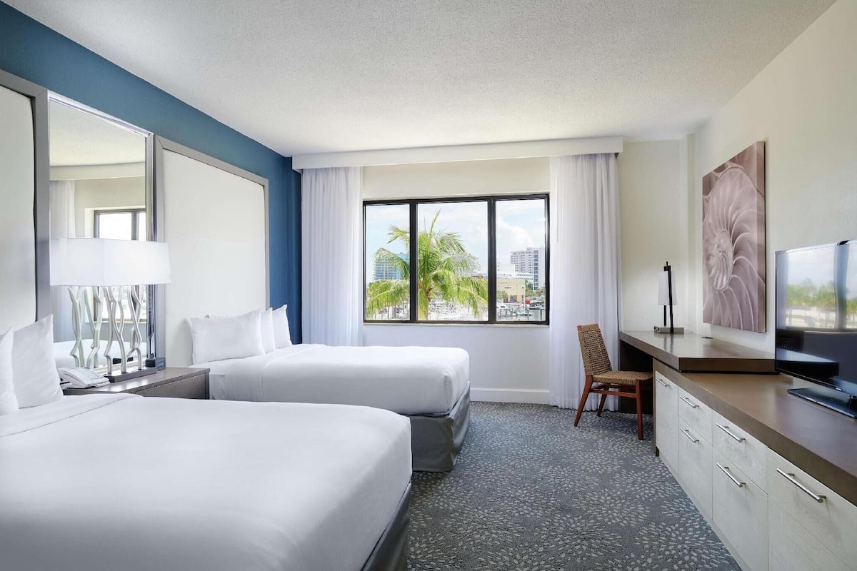 Down comforters, pillowtop beds, in-room safe, desk