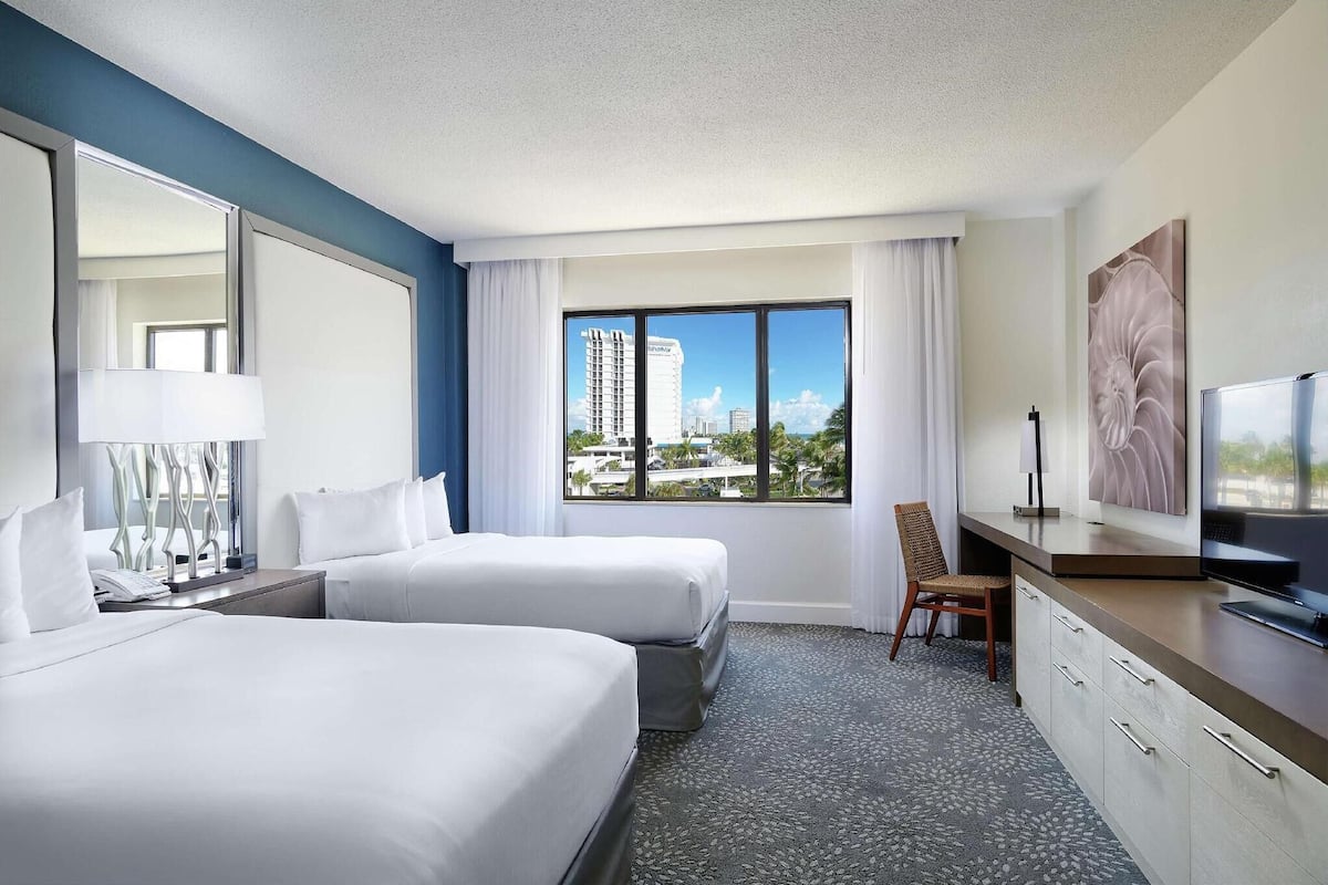 Down comforters, pillowtop beds, in-room safe, desk