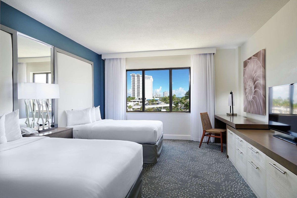 Down comforters, pillowtop beds, in-room safe, desk