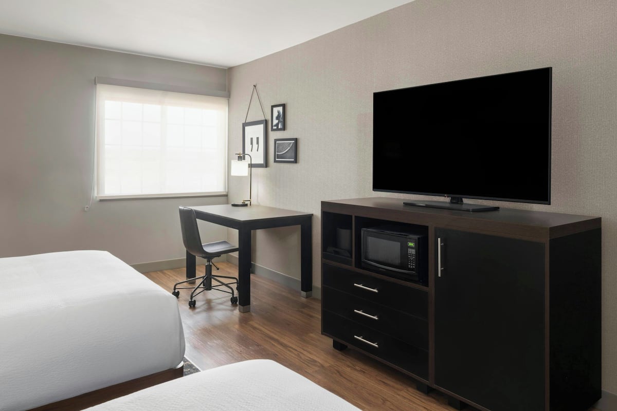 Suite, varias camas | Ropa de cama de alta calidad y edredón