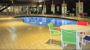 Indoor pool, open 9:00 AM to 10:00 PM, pool loungers