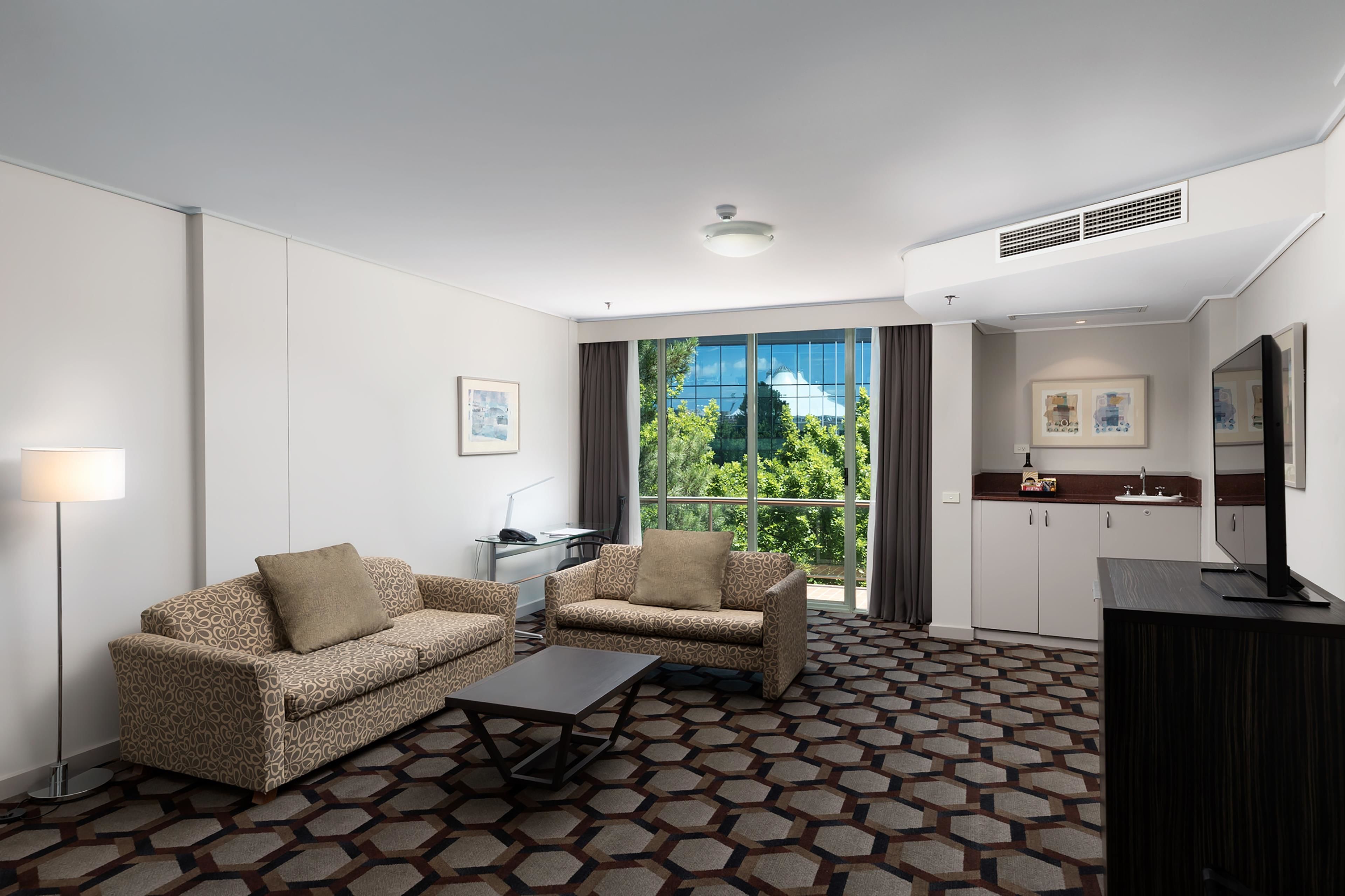 Embassy Suite | Premium bedding, pillowtop beds, individually decorated