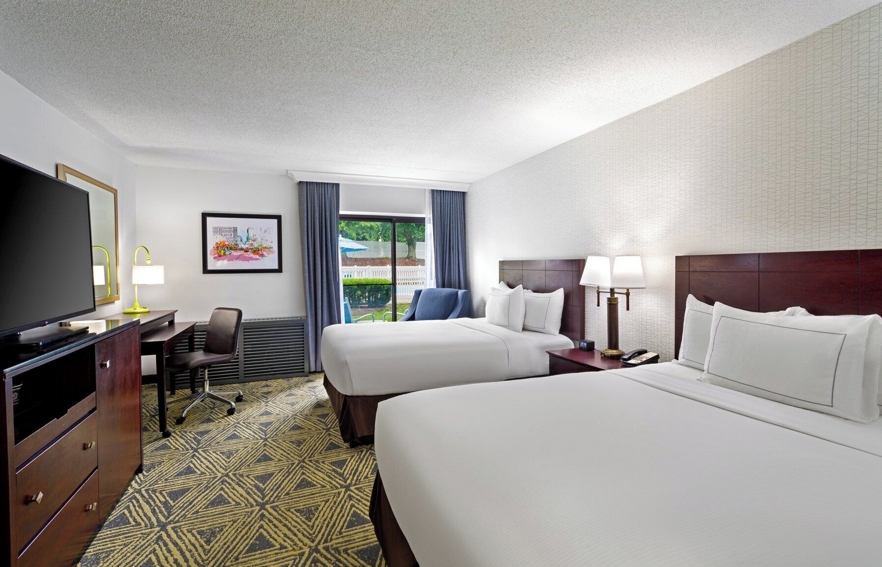 Premium bedding, pillow-top beds, in-room safe, individually decorated