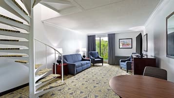 Suite, Non Smoking | Living area | 25-inch TV with cable channels