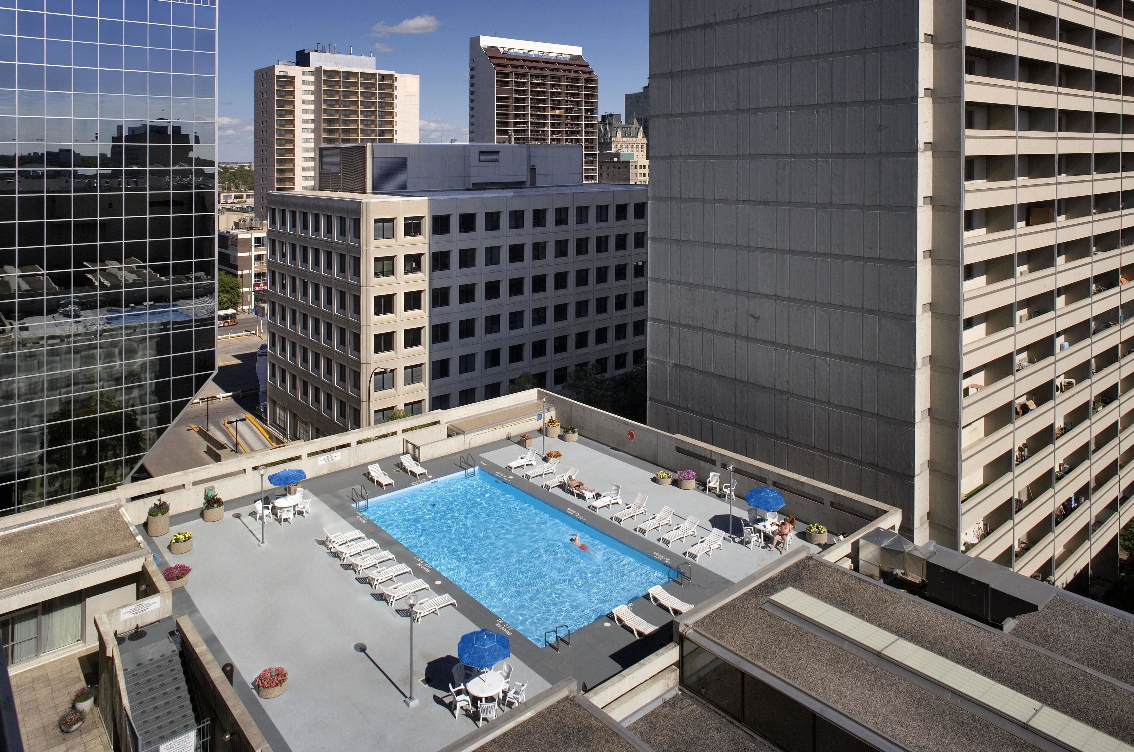 2 indoor pools, seasonal outdoor pool, pool umbrellas, pool loungers