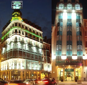 A hotel with a prominent sign, multiple floors, and a corner location. - Hotel Le Dome (Brussels)