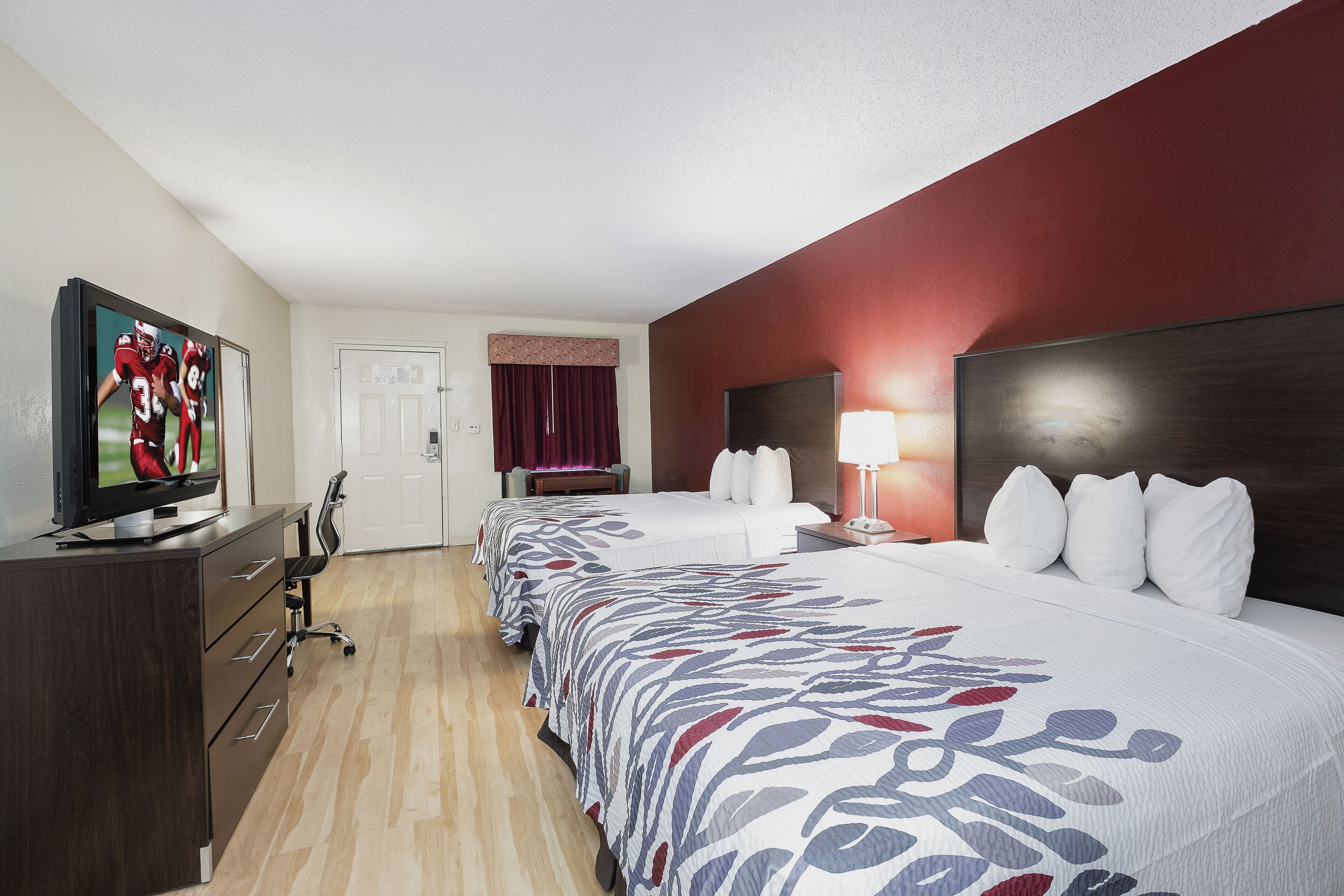 Desk, blackout curtains, iron/ironing board, rollaway beds