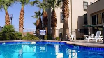 Indoor pool, outdoor pool, open 8:00 AM to 11 PM, pool umbrellas