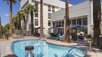 Indoor pool, outdoor pool, open 8:00 AM to 11 PM, pool umbrellas