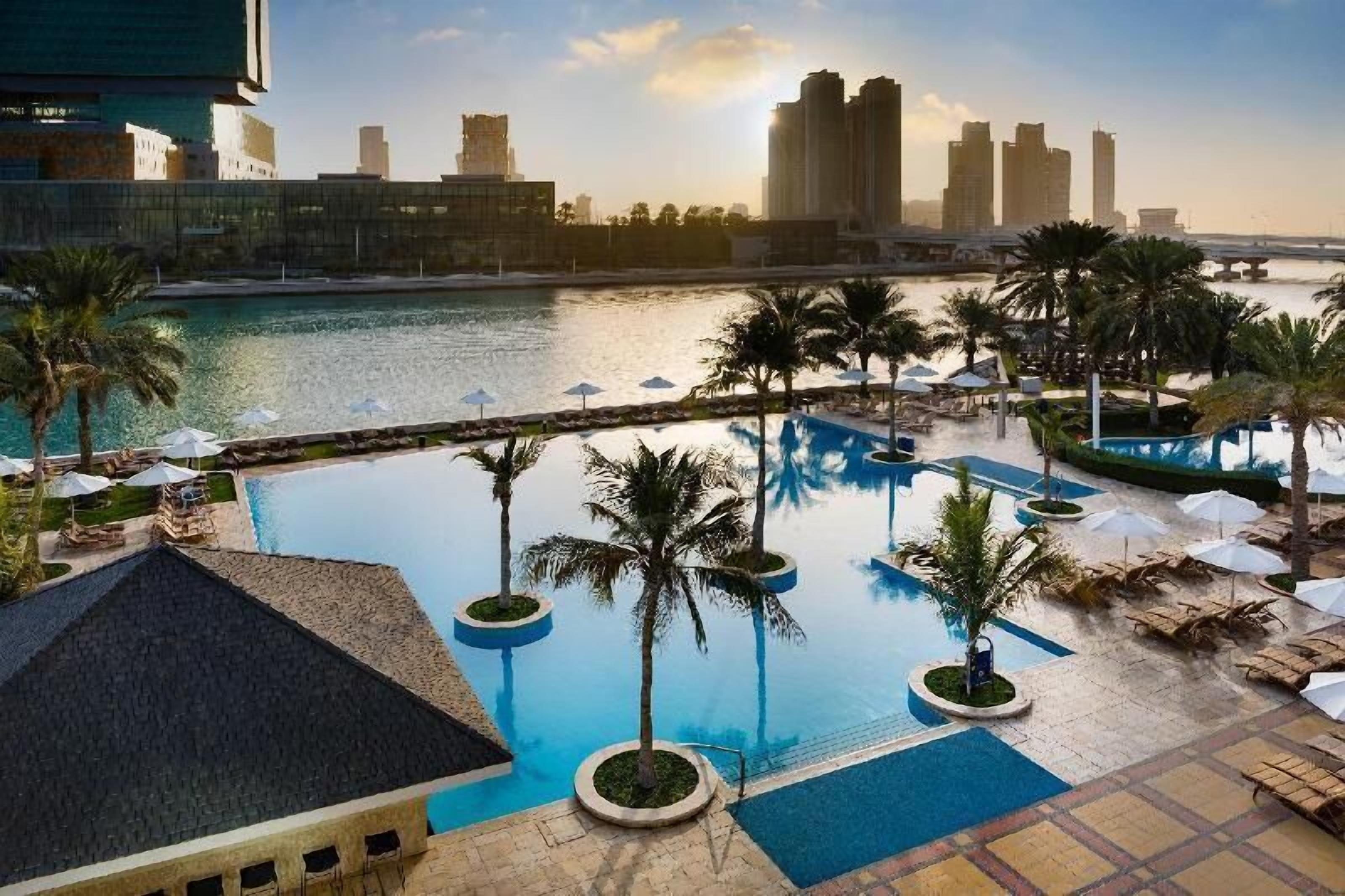 Pool | 2 outdoor pools, open 7:00 AM to 9:00 PM, pool umbrellas, sun loungers