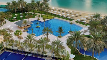 Outdoor pool, open 7:00 AM to 7:00 PM, pool umbrellas, pool loungers