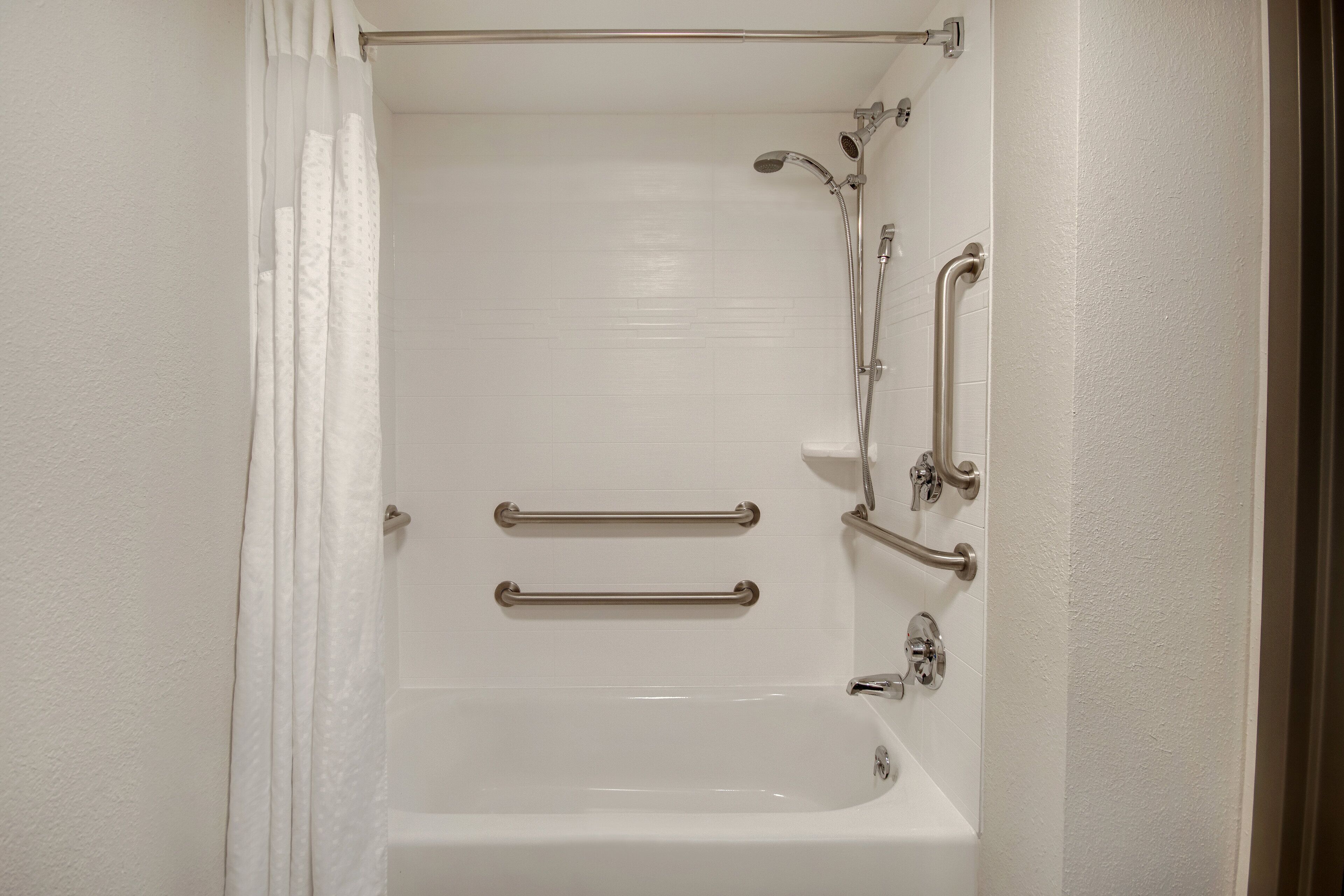 combined shower/bathtub, free toiletries, hair dryer, towels