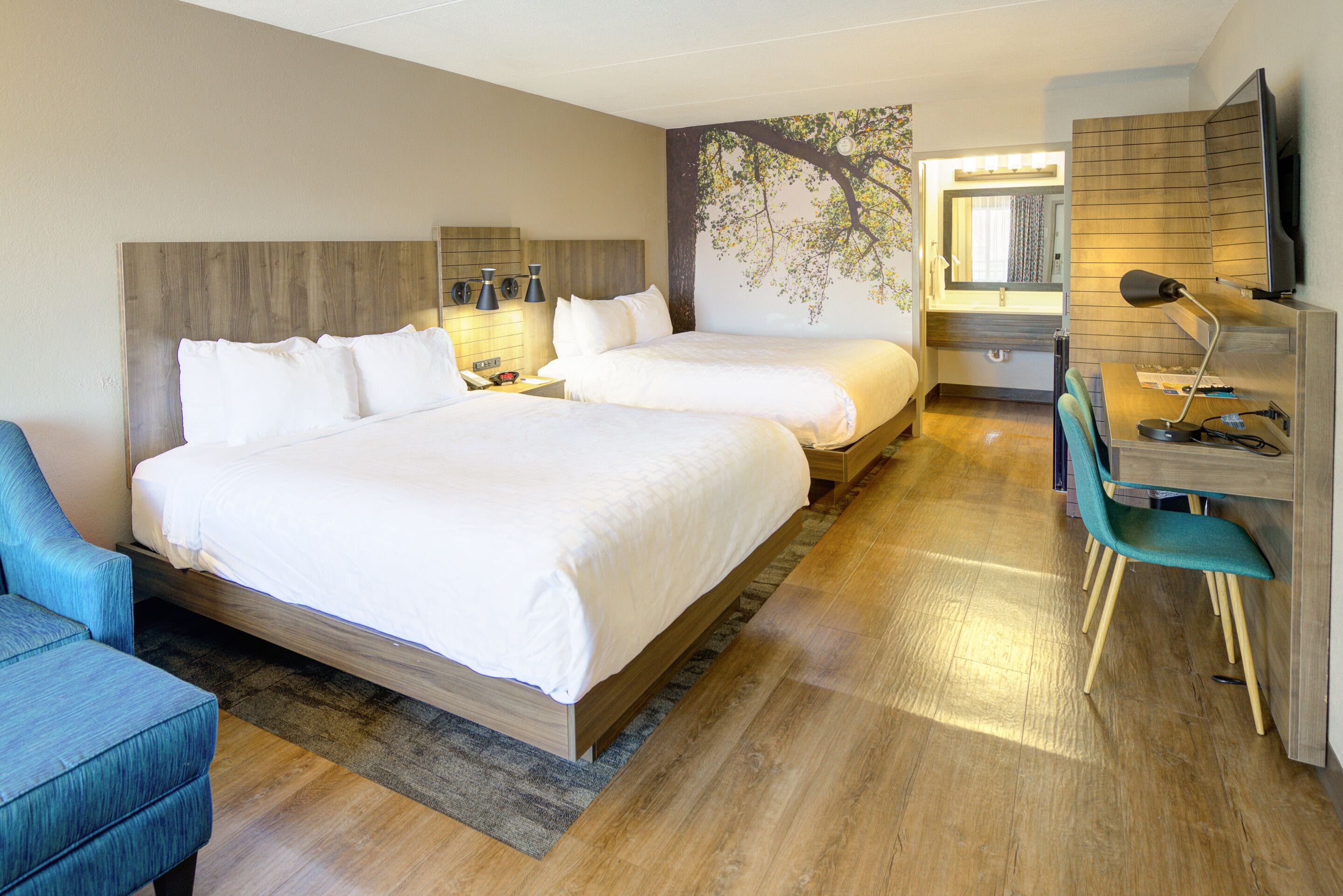 Desk, laptop workspace, blackout drapes, iron/ironing board