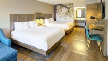 Desk, laptop workspace, blackout drapes, iron/ironing board