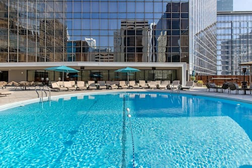 Seasonal outdoor pool, open 7:00 AM to 10:00 PM, pool loungers