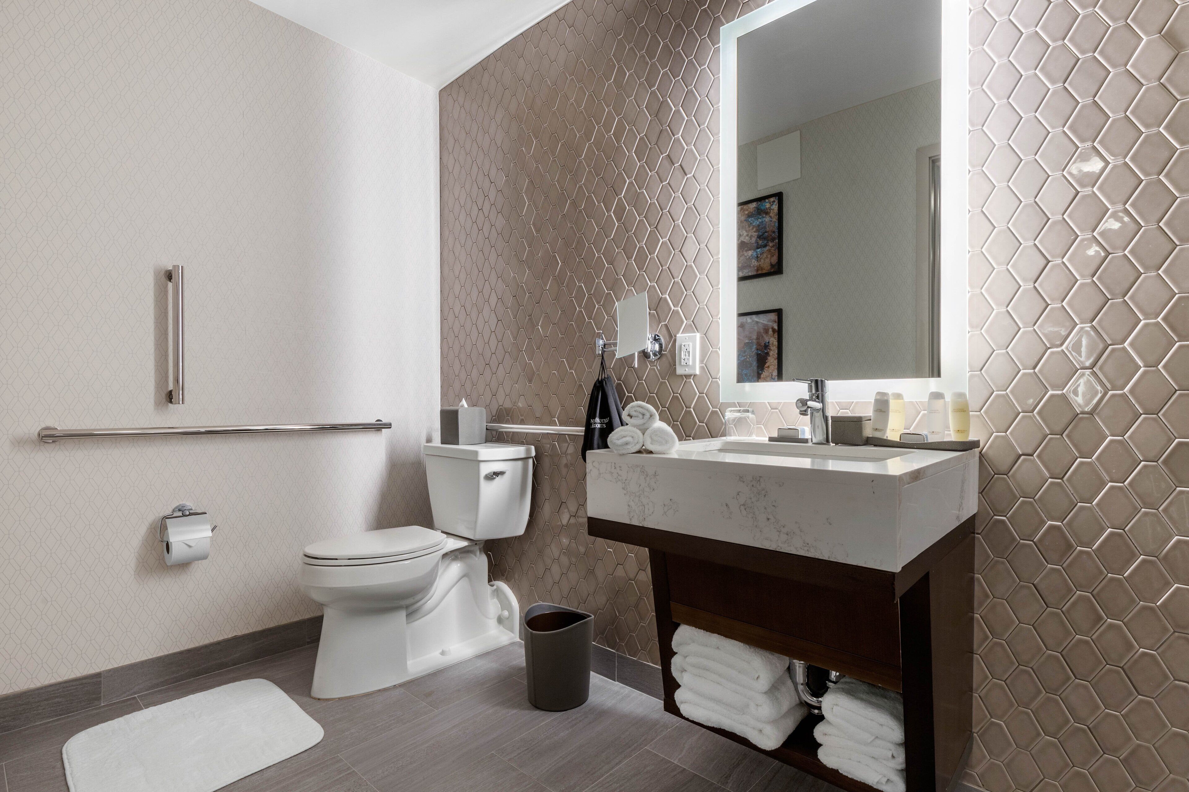 eco-friendly toiletries, hair dryer, bathrobes, slippers