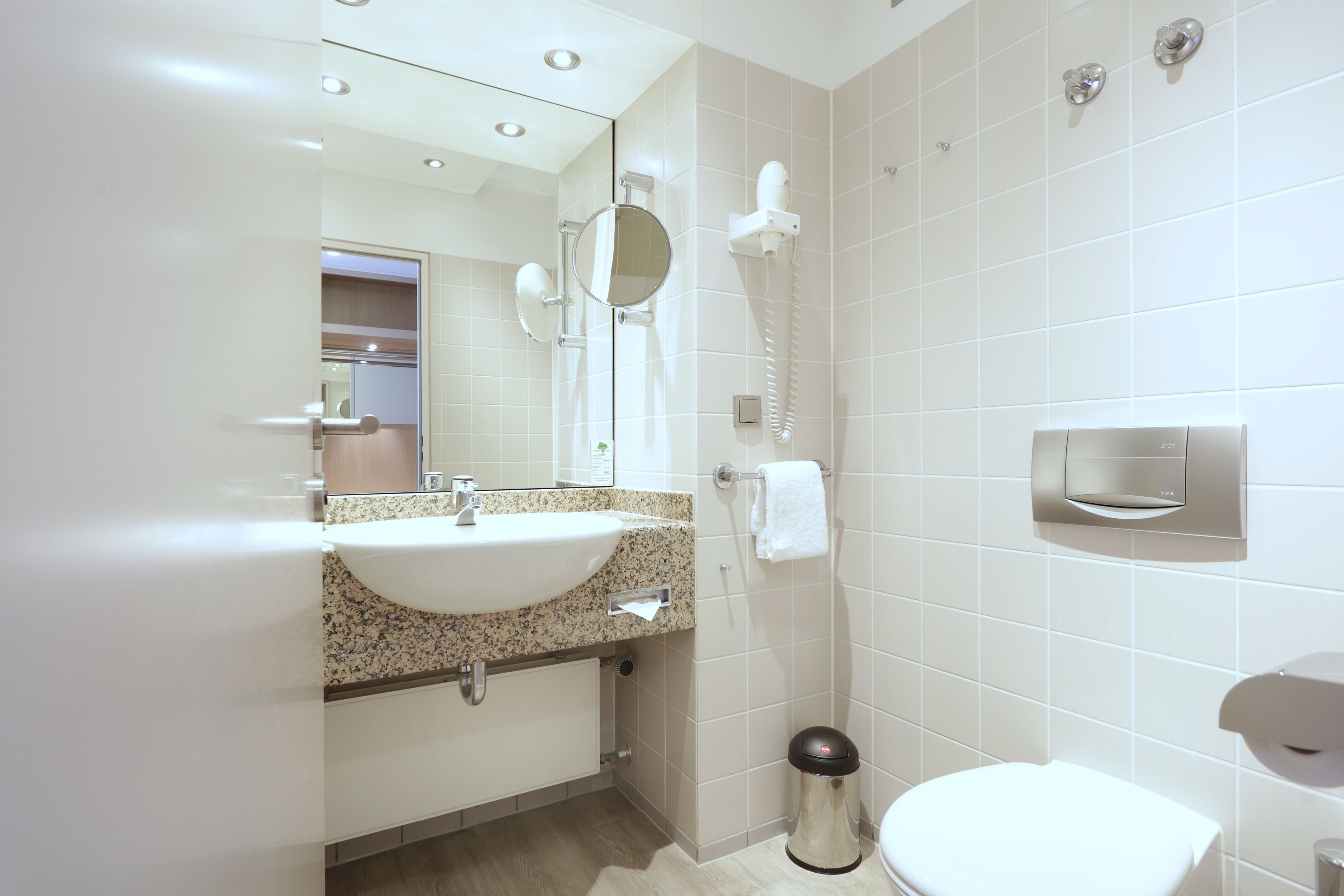 eco-friendly toiletries, hair dryer, towels, soap