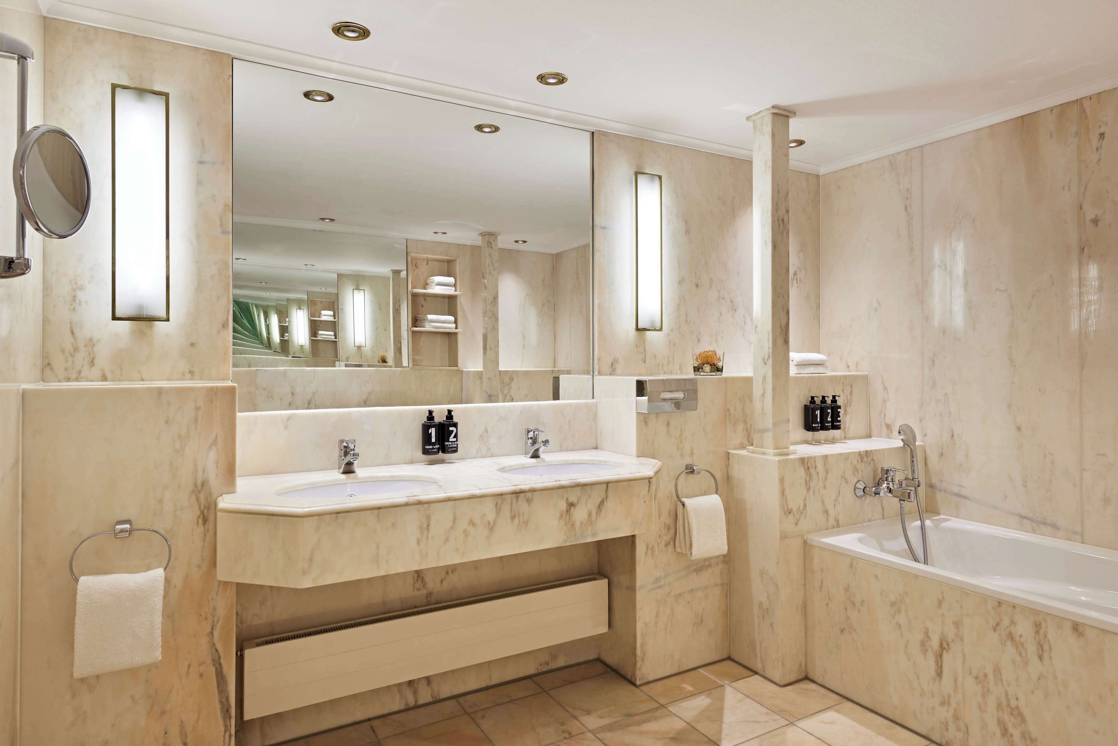 eco-friendly toiletries, hair dryer, towels, soap