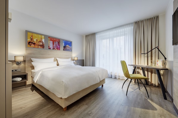 Hypo-allergenic bedding, minibar, in-room safe, desk