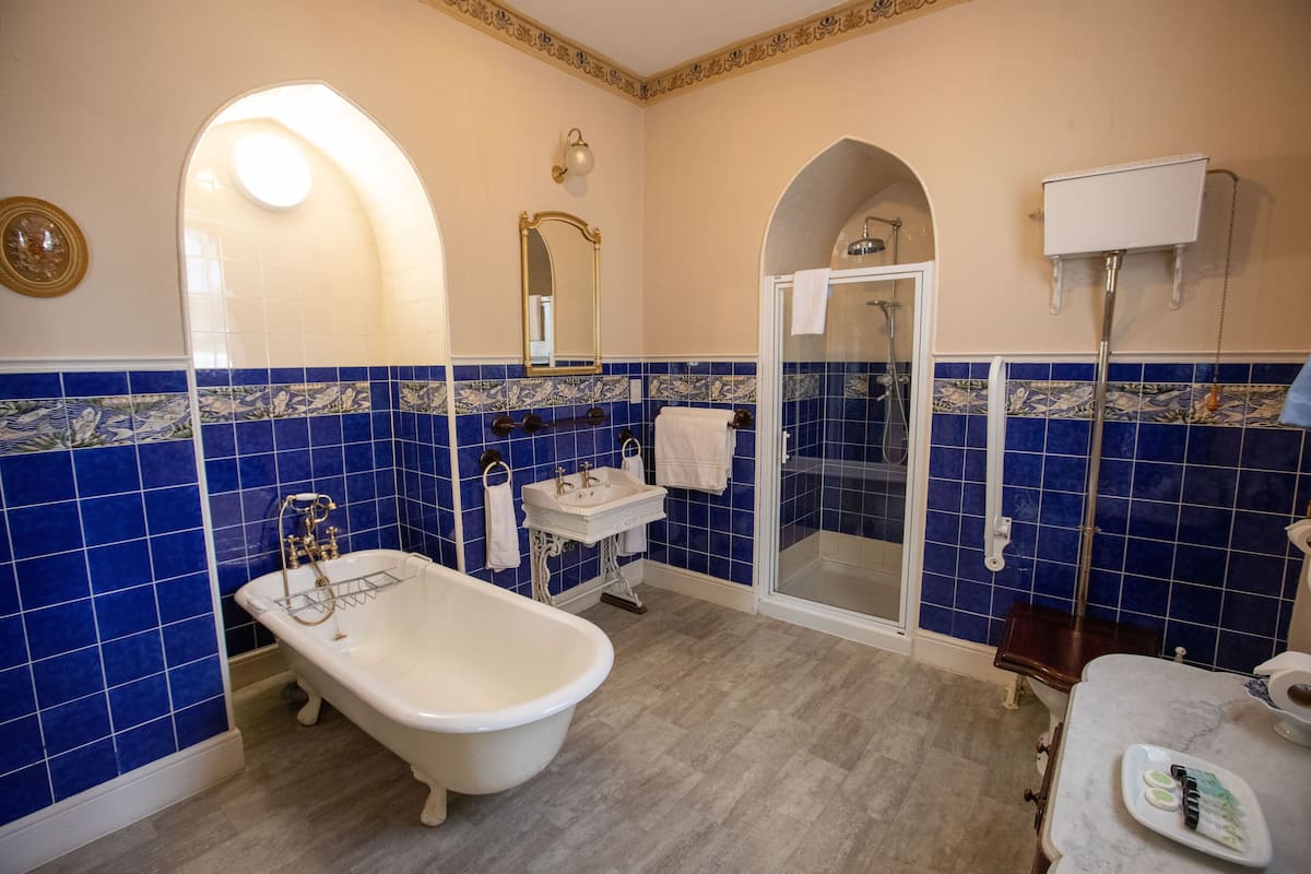 superior double room | bathroom | free toiletries, hair dryer, towels