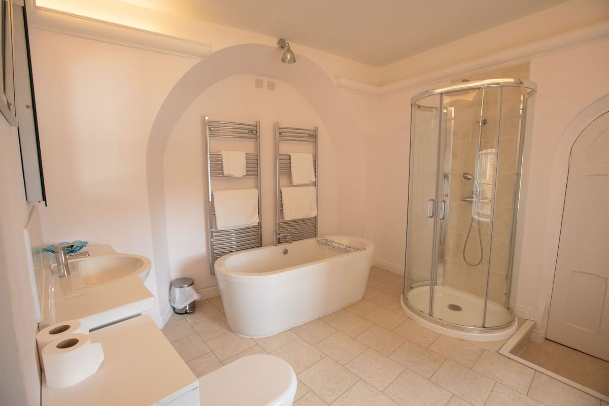 superior double room | bathroom | free toiletries, hair dryer, towels