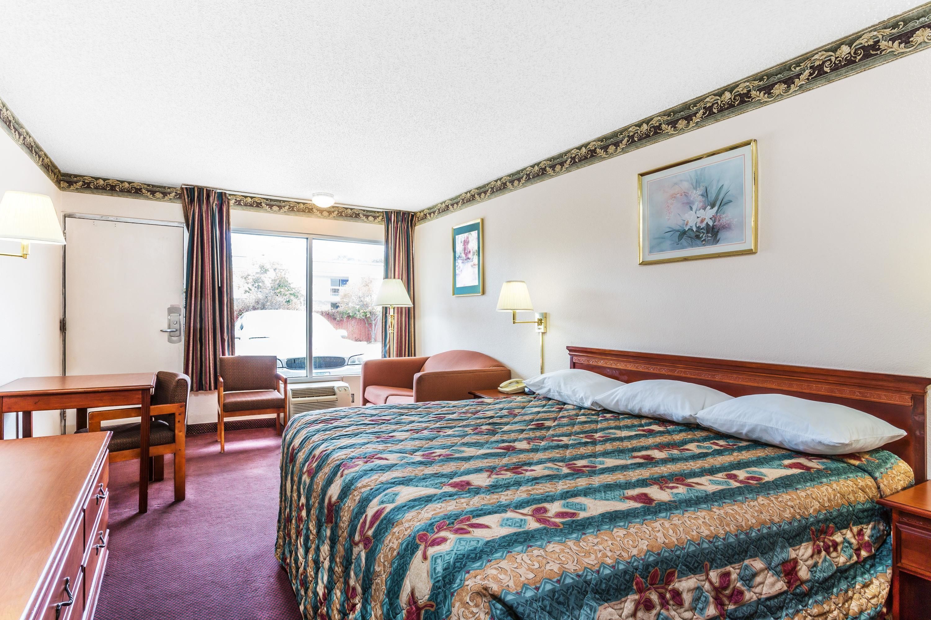 Desk, blackout drapes, iron/ironing board, free WiFi