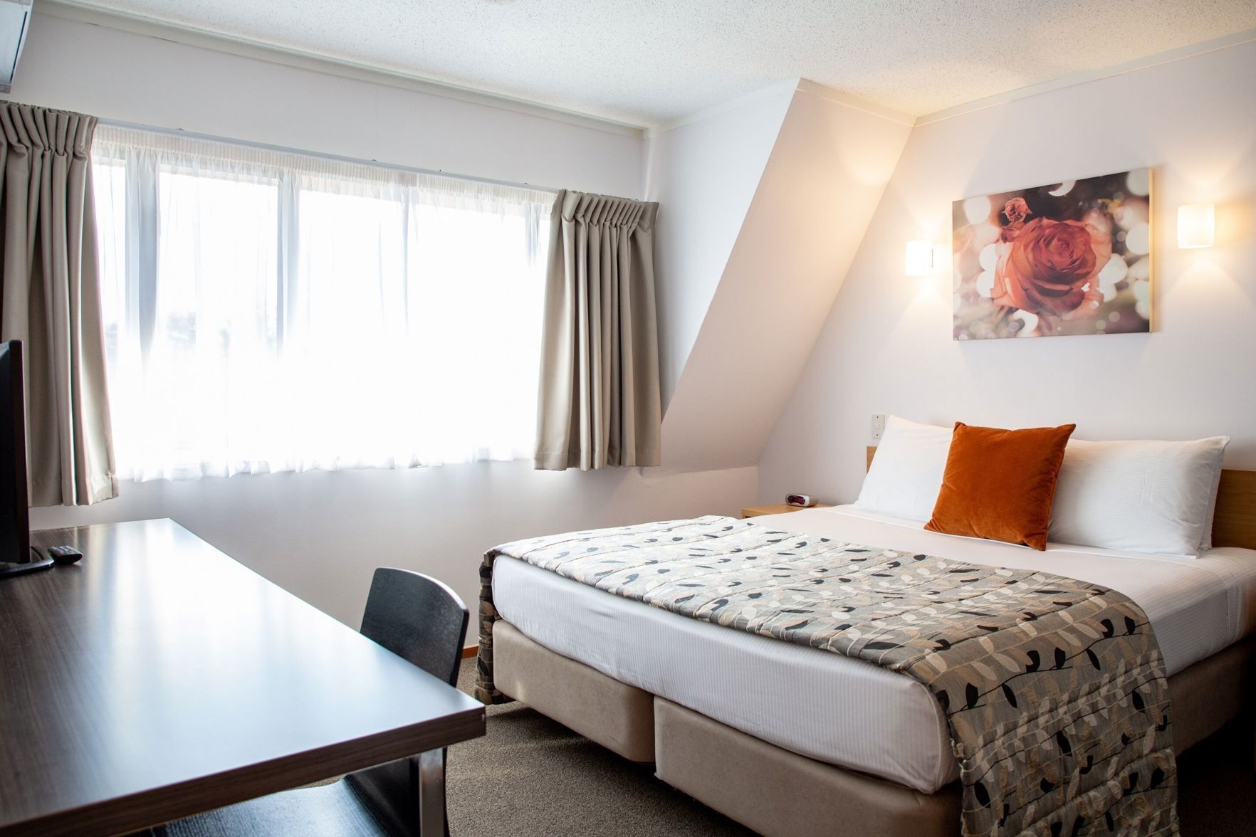 Individually decorated, individually furnished, desk, laptop workspace