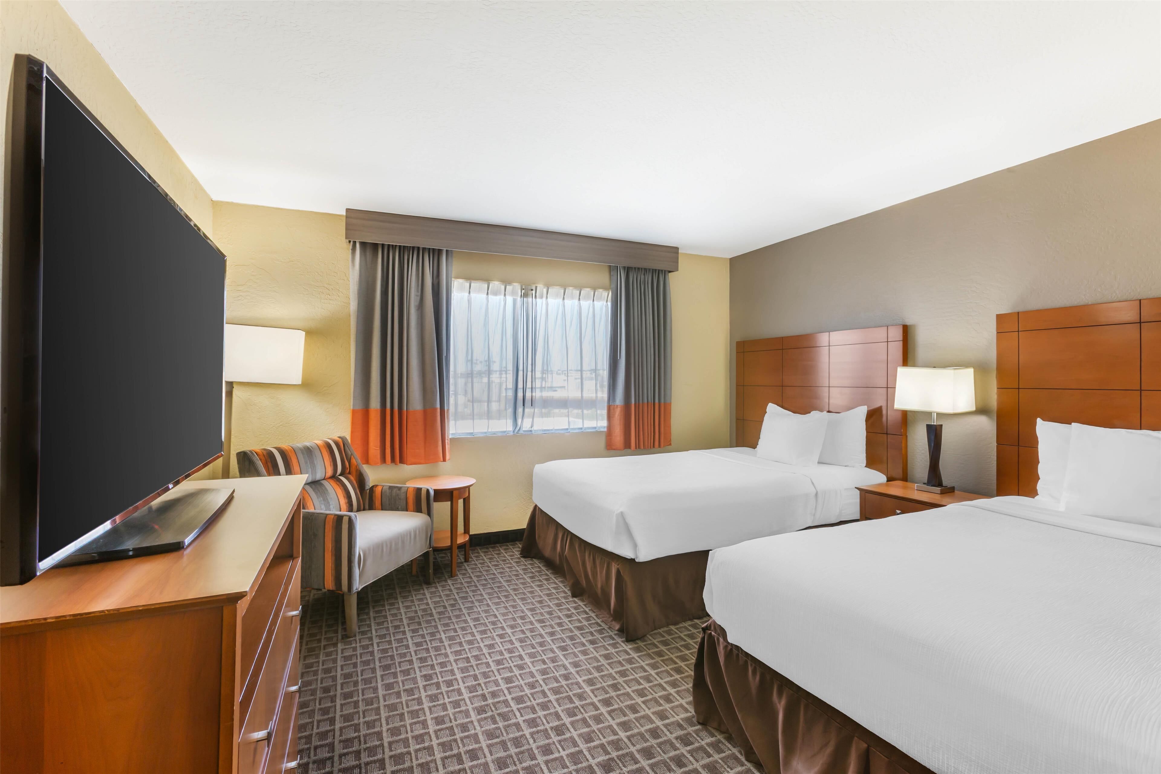 Premium bedding, pillow-top beds, in-room safe, desk