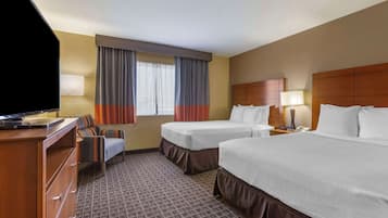 Suite, 2 camas dobles, no fumadores, balcón (with Sofabed) | Ropa de cama de alta calidad y colchones con acolchado adicional