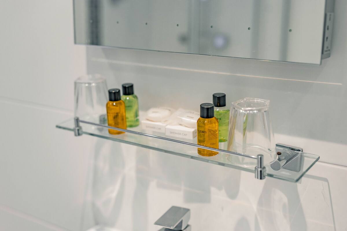 family room with outdoor seating | bathroom | combined shower/bathtub, hair dryer, towels