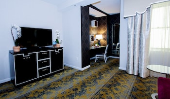 Premium bedding, in-room safe, laptop workspace, blackout drapes at The Churchill Hotel near Embassy Row